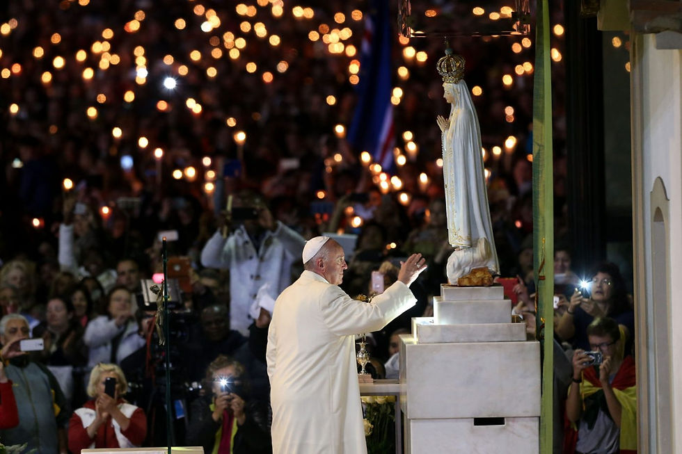 Pope Francis prays in front of the statue of Our Lady of Fatima at the Shrine of Our Lady of Fatima in preparation for the 100th anniversary of the Fatima apparitions and the canonization of Francisco and Jacinta Marto on May 12, 2017. (Photo: LUSA Press Agency)