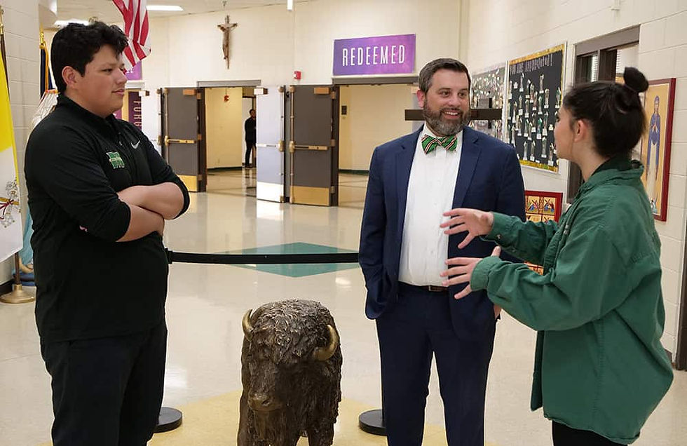 Erich Hoffer (center) will serve as Bishop Machebeuf's new President. (Photo provided)