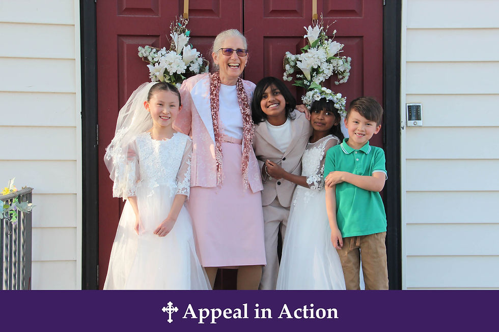 Smiling woman and four children in formal clothes stand on a porch with floral wreaths; banner reads Appeal in Action.