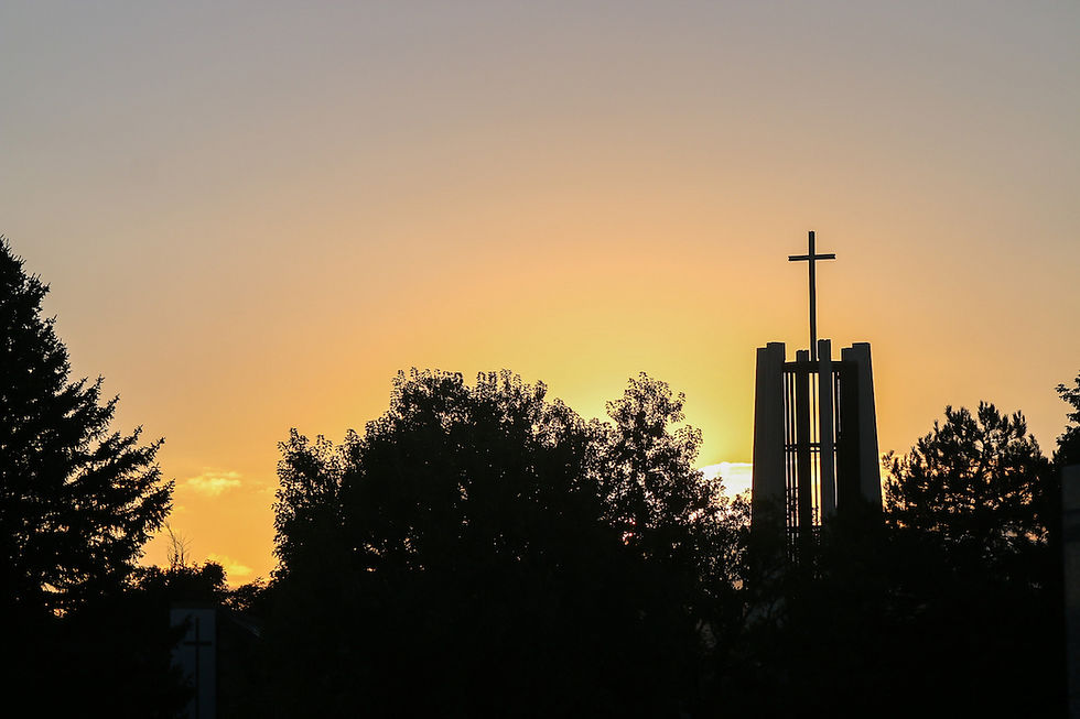 A white sun symbolizing the Holy Spirit against a blue to yellow gradient, representing hope.