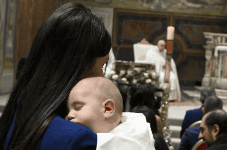 A baby sleeps at the feast of the Baptism of the Lord at the Sistine Chapel, Sunday, Jan. 12, 2025. (Photo: Vatican Media)