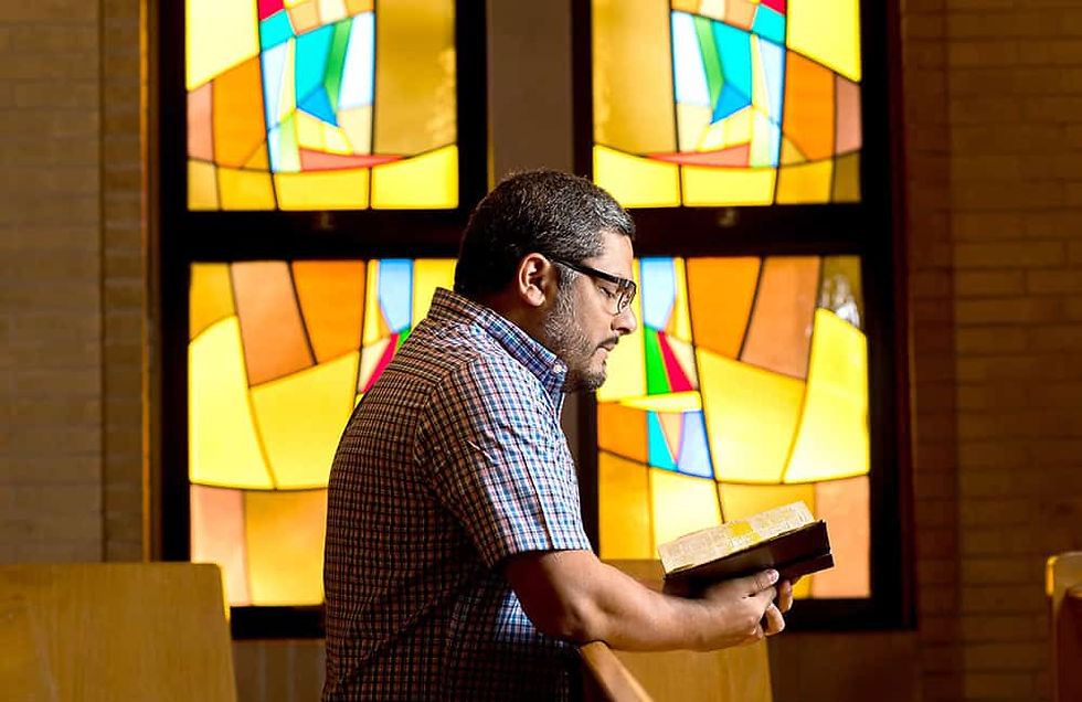 Ruben Leon poses for a portrait at Holy Name Catholic Church