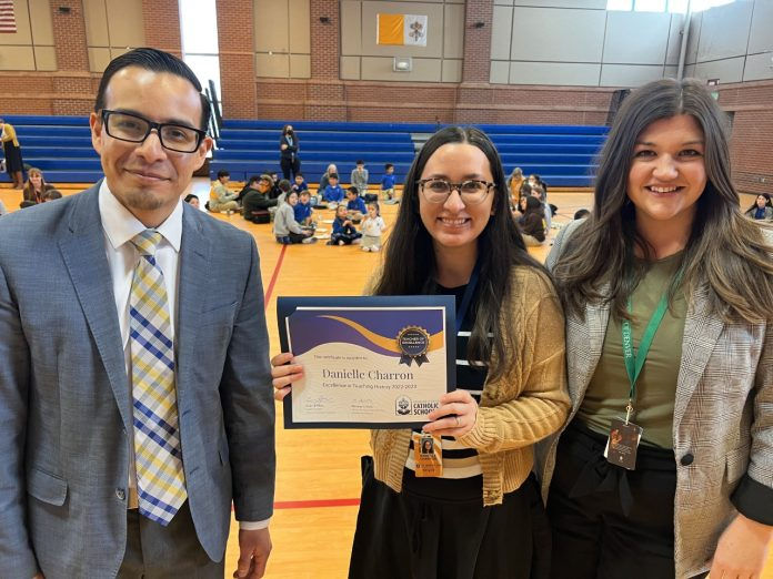 Excellence in Teaching History winner Danielle Charron (center) at Bl. Miguel Pro Catholic Academy with Denver Catholic Schools superintendent Elias Moo (left) and Associate Superintendent of Academic Renewal​ Abriana Chilelli (right). (Photo by Carol Nesbitt)