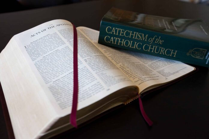 The Catechism of the Catholic Church and Bible are primary resources for growing in the faith and sharing it with others. (Photo by Andrew Wright/Denver Catholic)