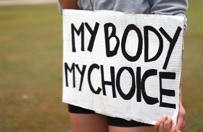 Sign reading "My body my choice"