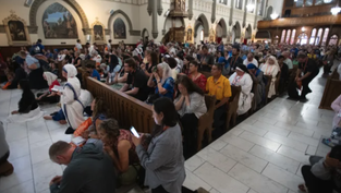 Packed adoration chapel at National Eucharistic Congress overflows with devotion to Jesus