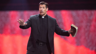 Father Mike Schmitz preaches repentance at National Eucharistic Congress