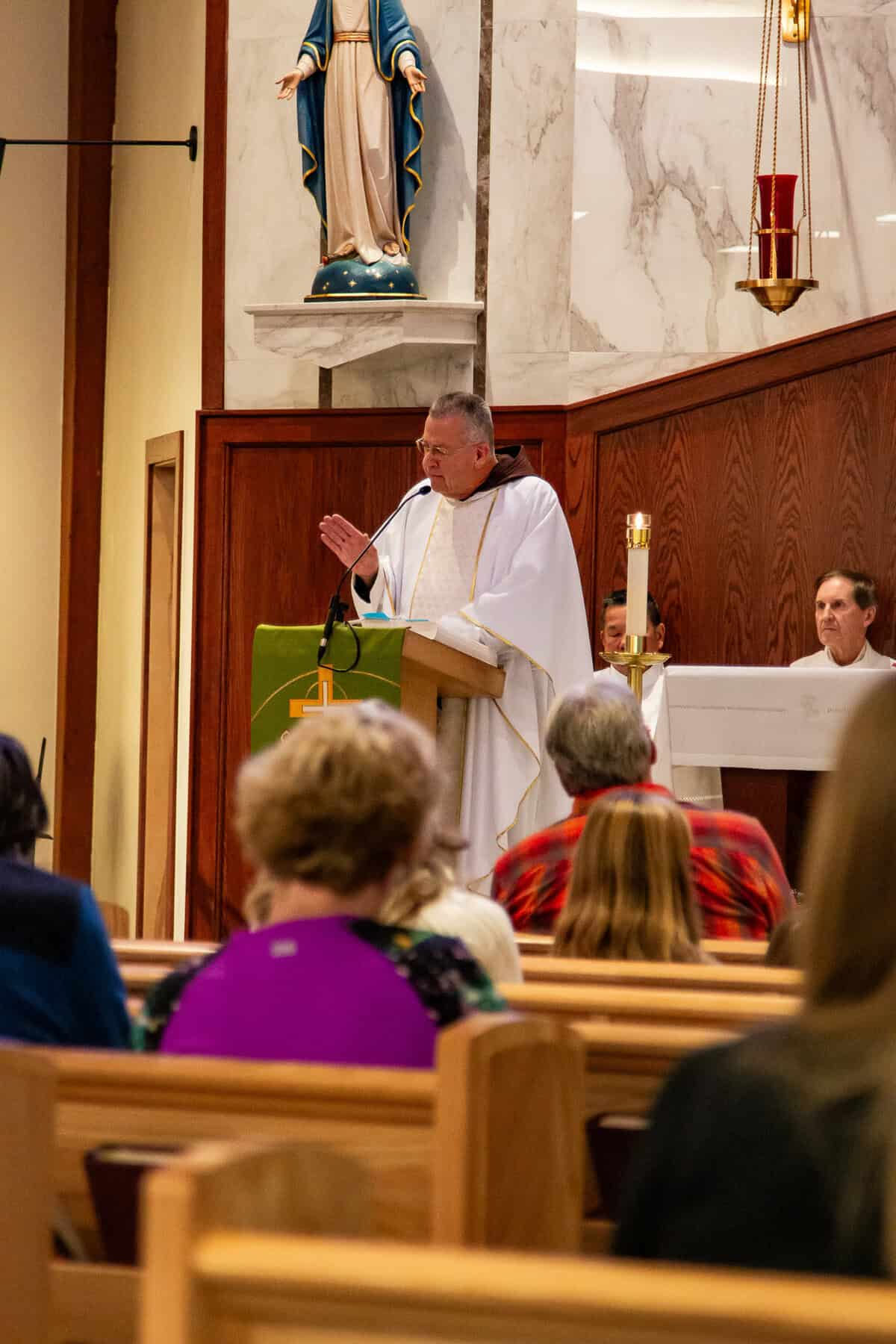 Fr. John Lager, O.F.M. Cap. preaches at the feast day Mass at Mother Cabrini Shrine in Golden.