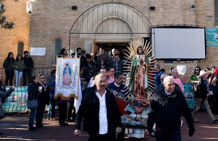 Parishioners carry the statue of Our Lady of Guadalupe during a traditional procession following mass celebrating the announcement of Our Lady of Guadalupe Parish as a diocesan shrine on December 11, 2016, in Denver, Colorado. (Photo by Anya Semenoff/Denver Catholic)