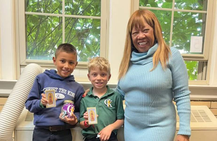 Sandy Moss (right)lives a mission of unity as the Cultural Diversity Director at Christ the King Catholic School. (Photo Provided)