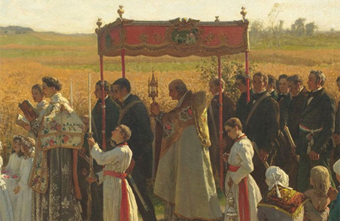 Procession with the Eucharist in a monstrance