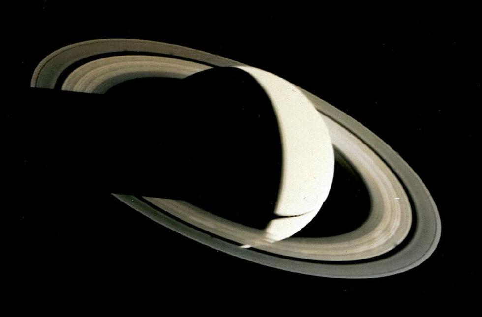 Crescent Saturn in space