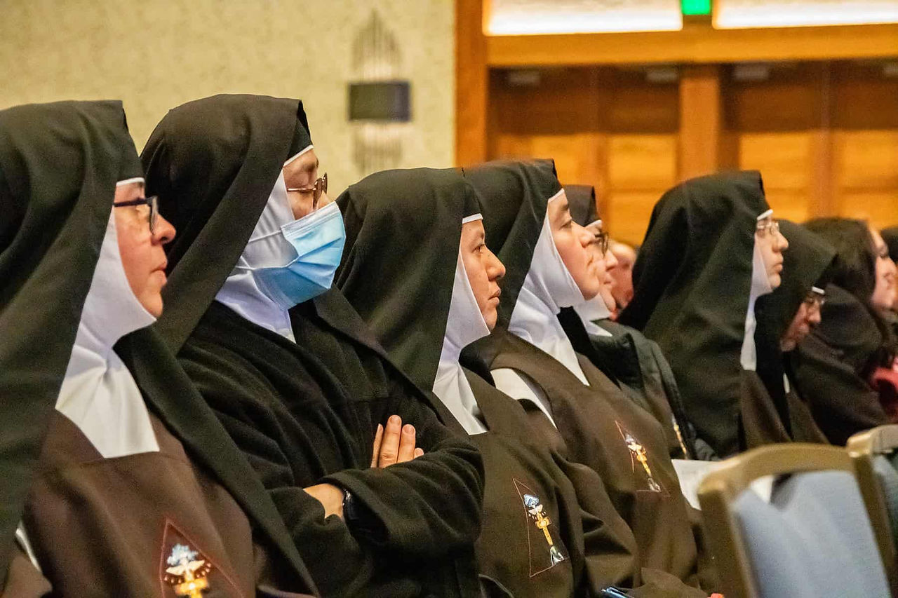 Sister Isabel's sisters were present throughout the day, joining thousands of faithful.