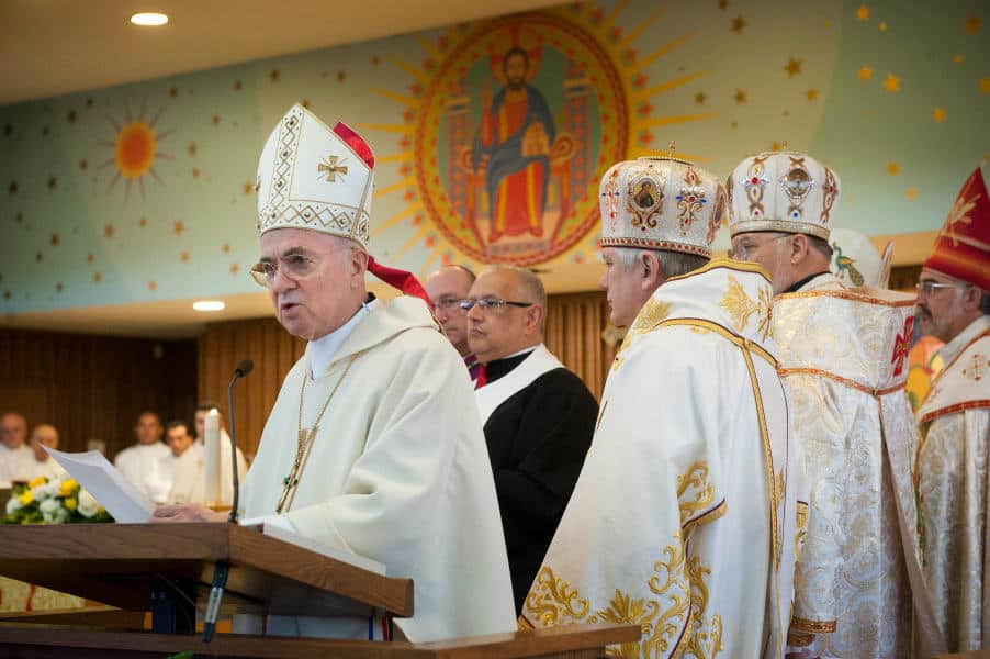 Archbishop Carlo Maria Vigano reading a letter from the Pope