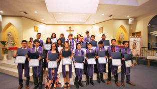 First eighth grade class graduates from Escuela de Guadalupe