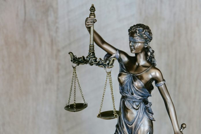 Statue holding scales