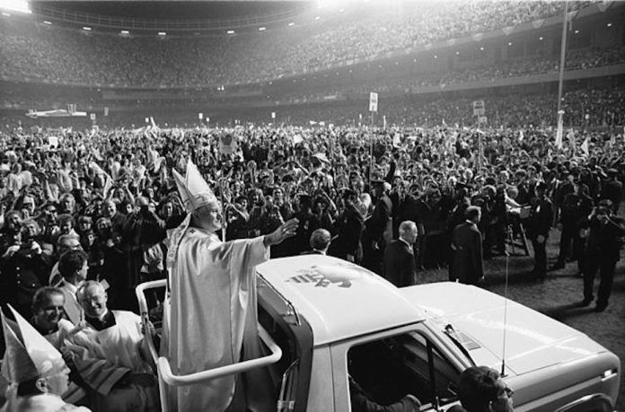 Pope John Paul II driving through an old Yankee Stadium