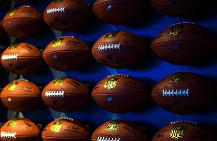 Footballs hanging on a wall