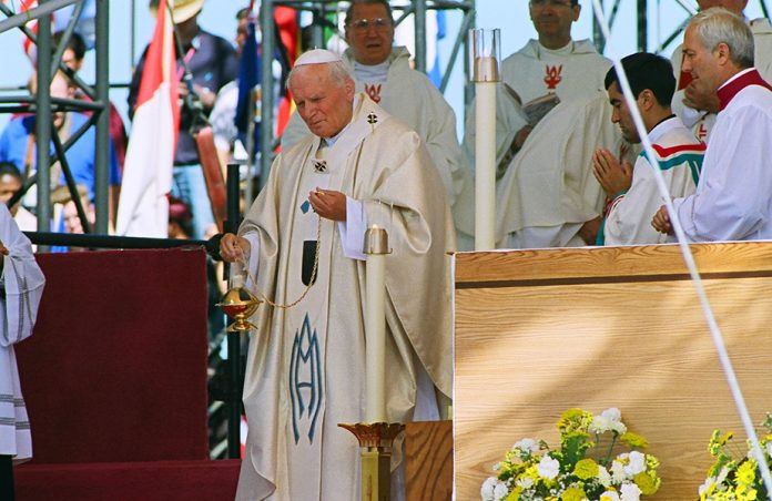 Pope St. John Paul II celebrates the Eucharist at World Youth Day in Cherry Creek State Park, Denver, on August 15, 1993. (File photo by James Baca)