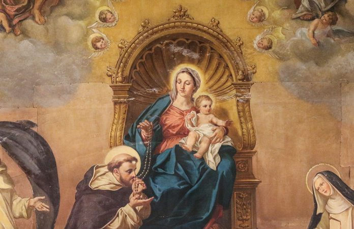 Mary on throne holding baby Jesus and a rosary