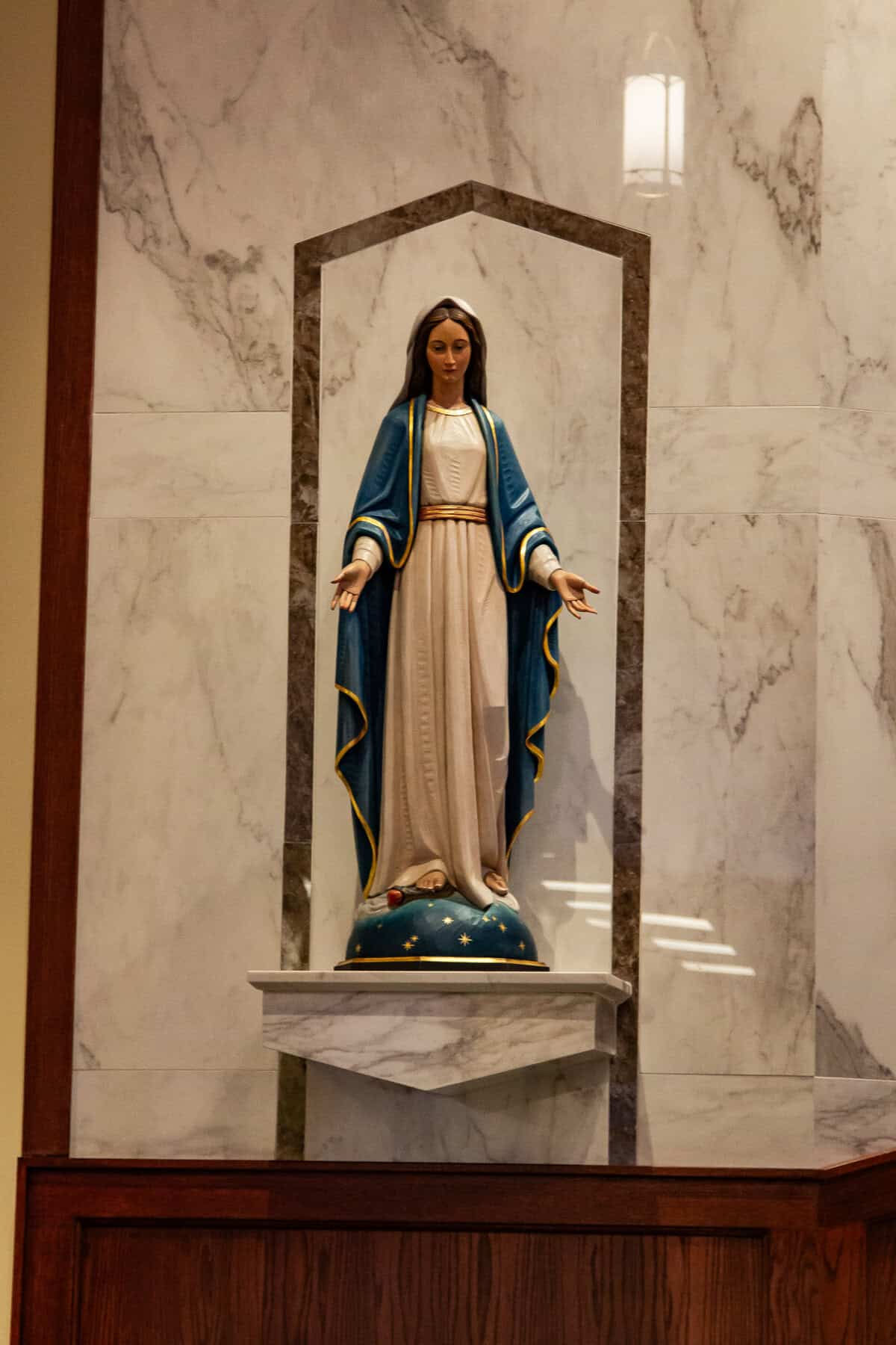 Newly installed statues adorn the property, including the statue of the Blessed Virgin Mary.