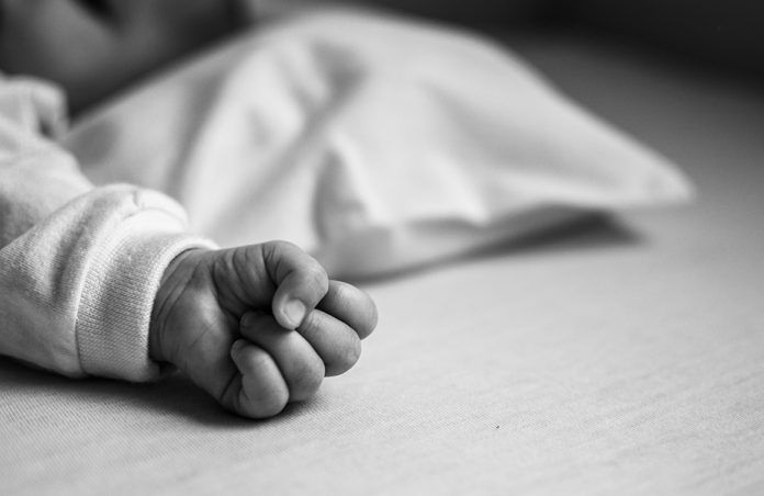 Baby's hand in a fist
