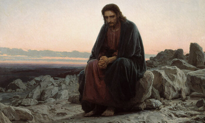 Jesus sitting alone in the Wilderness