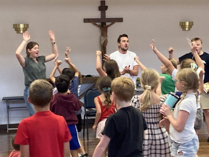 Cody Bliss and other missionaries lead a Totus Tuus youth session. (Photo provided)