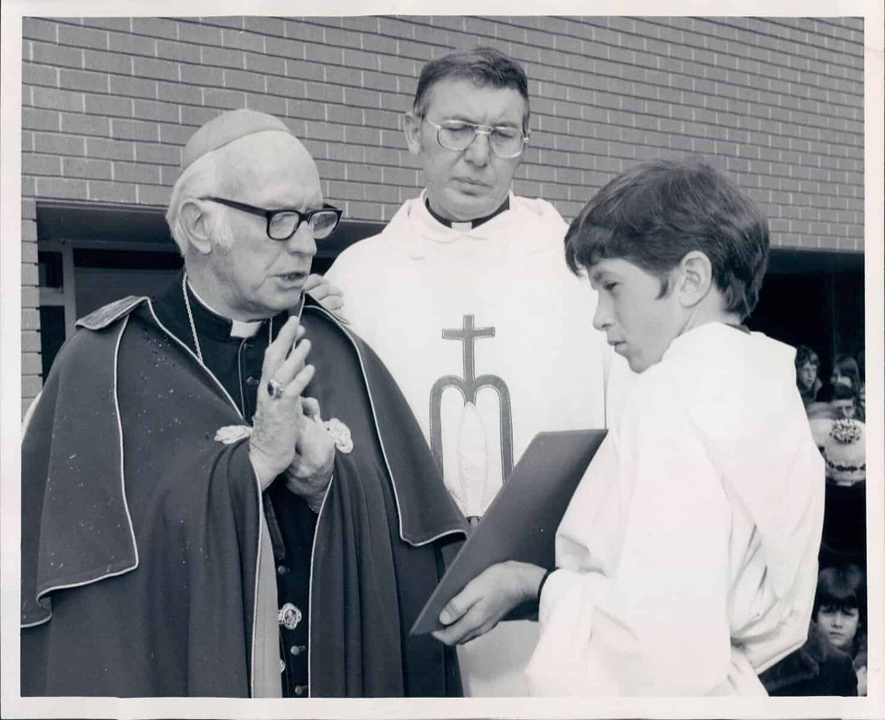 Archbishop James Casey visits on Nov. 24, 1977